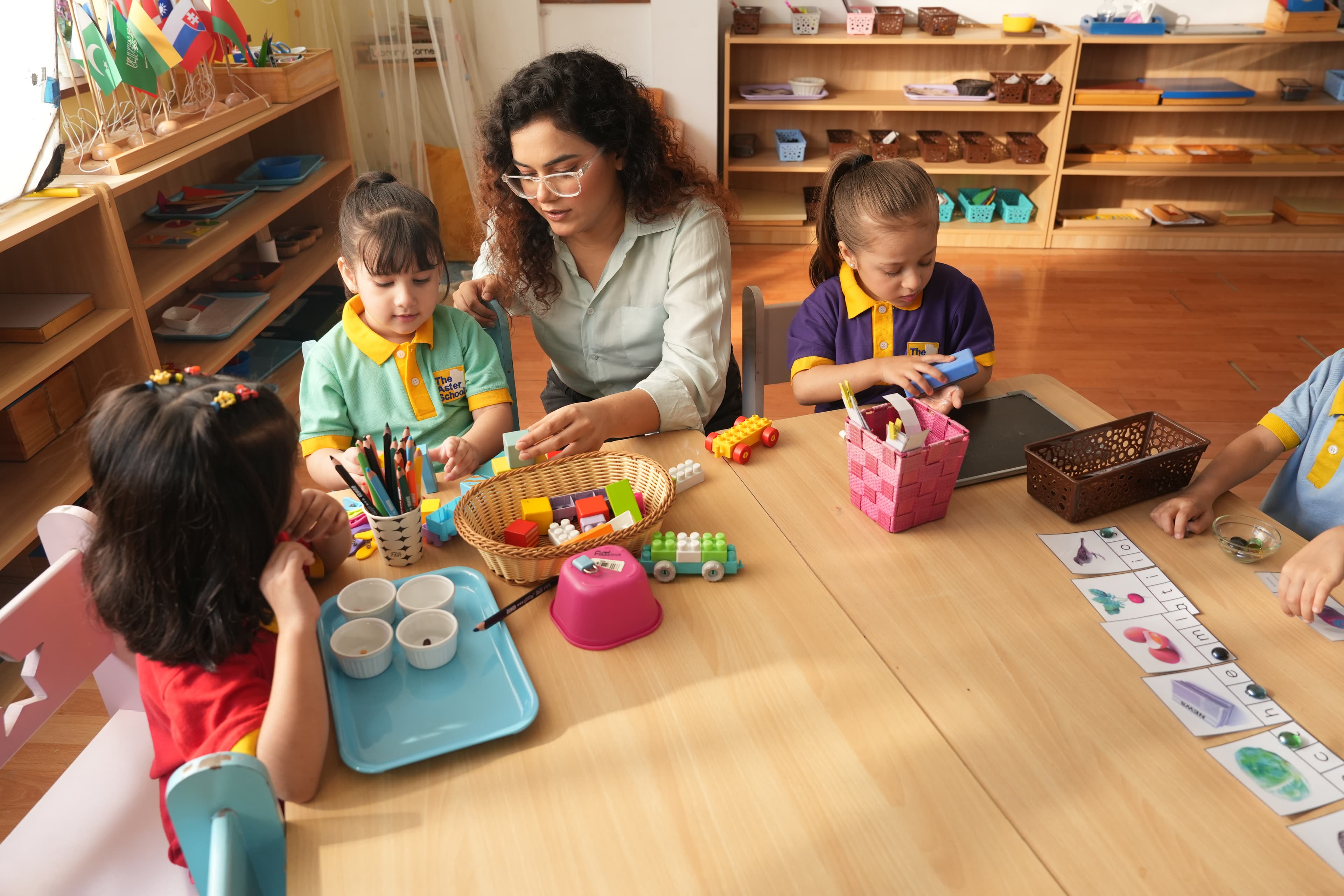 An Aster educator at work in the classroom